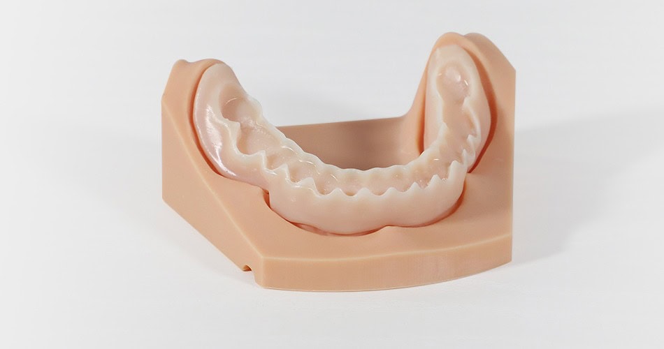 Impresora 3D de resina PioCreat D150 2 Modelo de prótesis dental en yeso para estudios y planificación en odontología. Ideal para la fabricación y ajuste de prótesis dentales en clínicas y laboratorios.