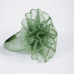 Impresora 3D de resina PioCreat DJ68 9K 16 Cortador dental de precisión de color verde, utilizado en procedimientos odontológicos para cortes precisos en tratamientos dentales.